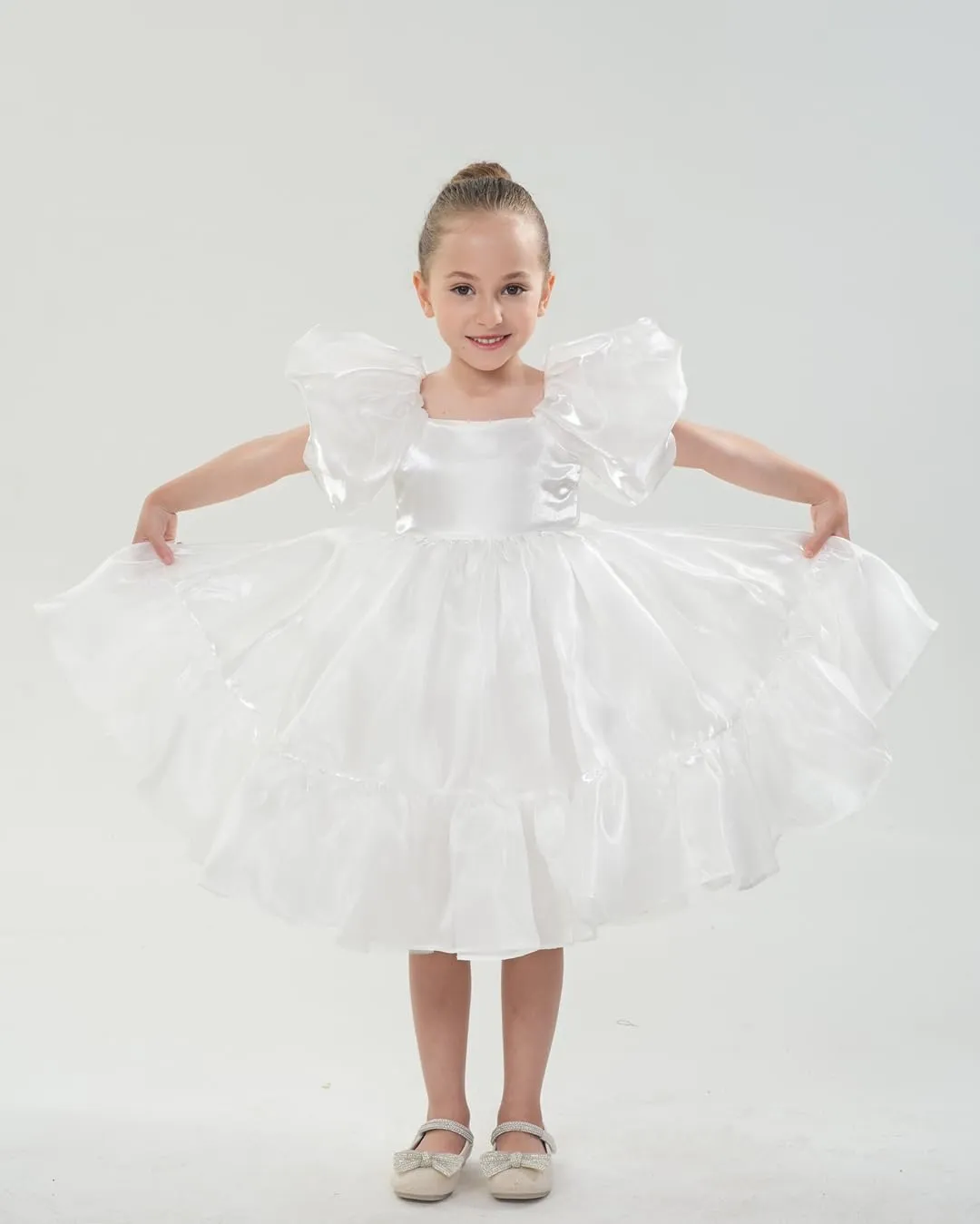 2Bunnies Girls' Organza Puff Sleeve Babydoll Dress in White Ruffle Hem