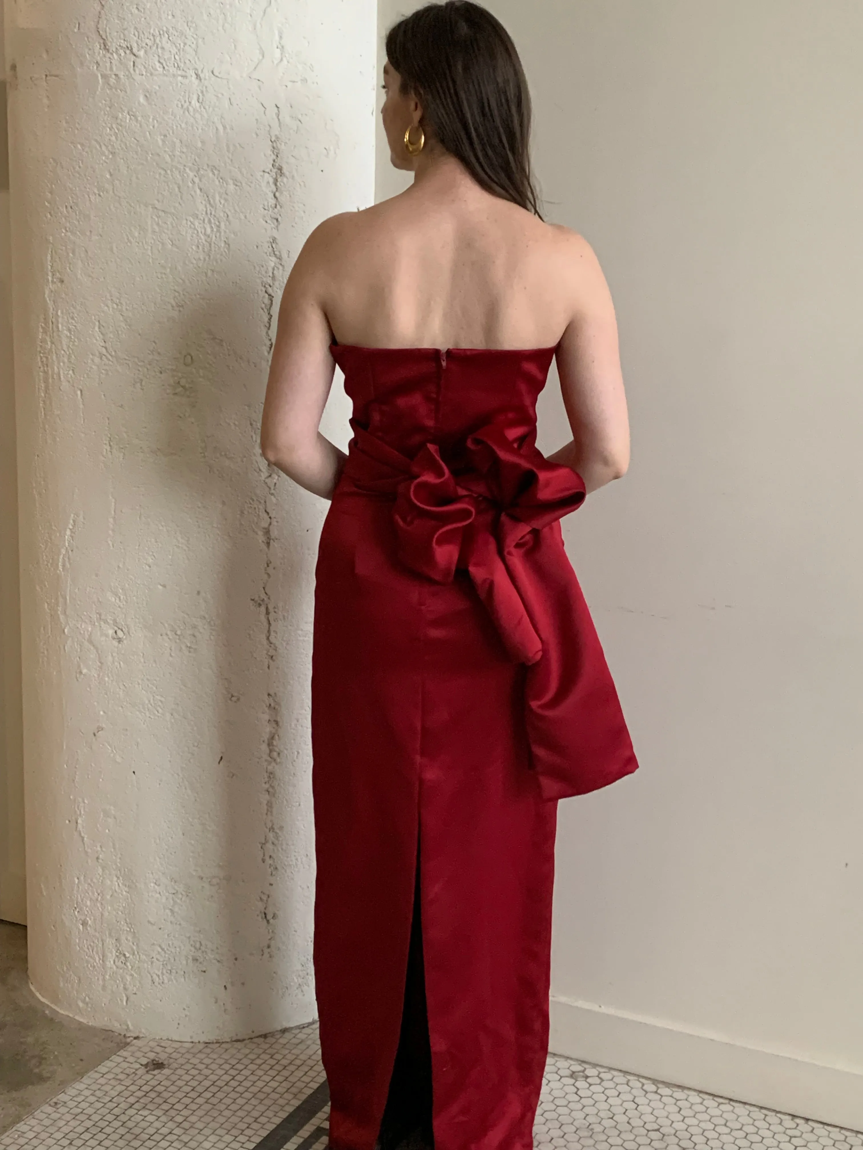 Red satin strapless gown