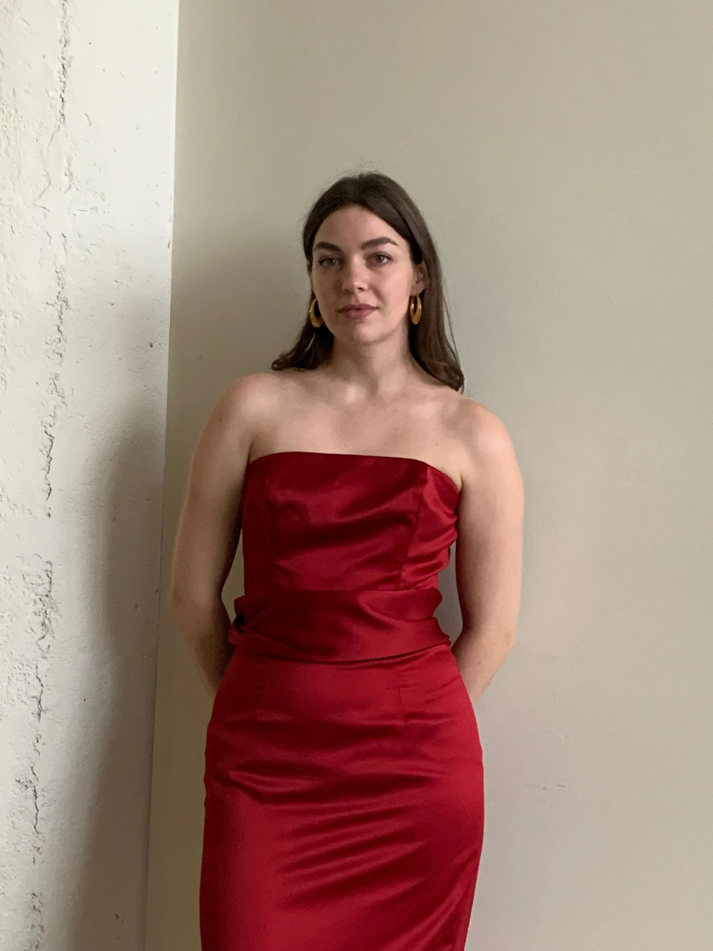 Red satin strapless gown