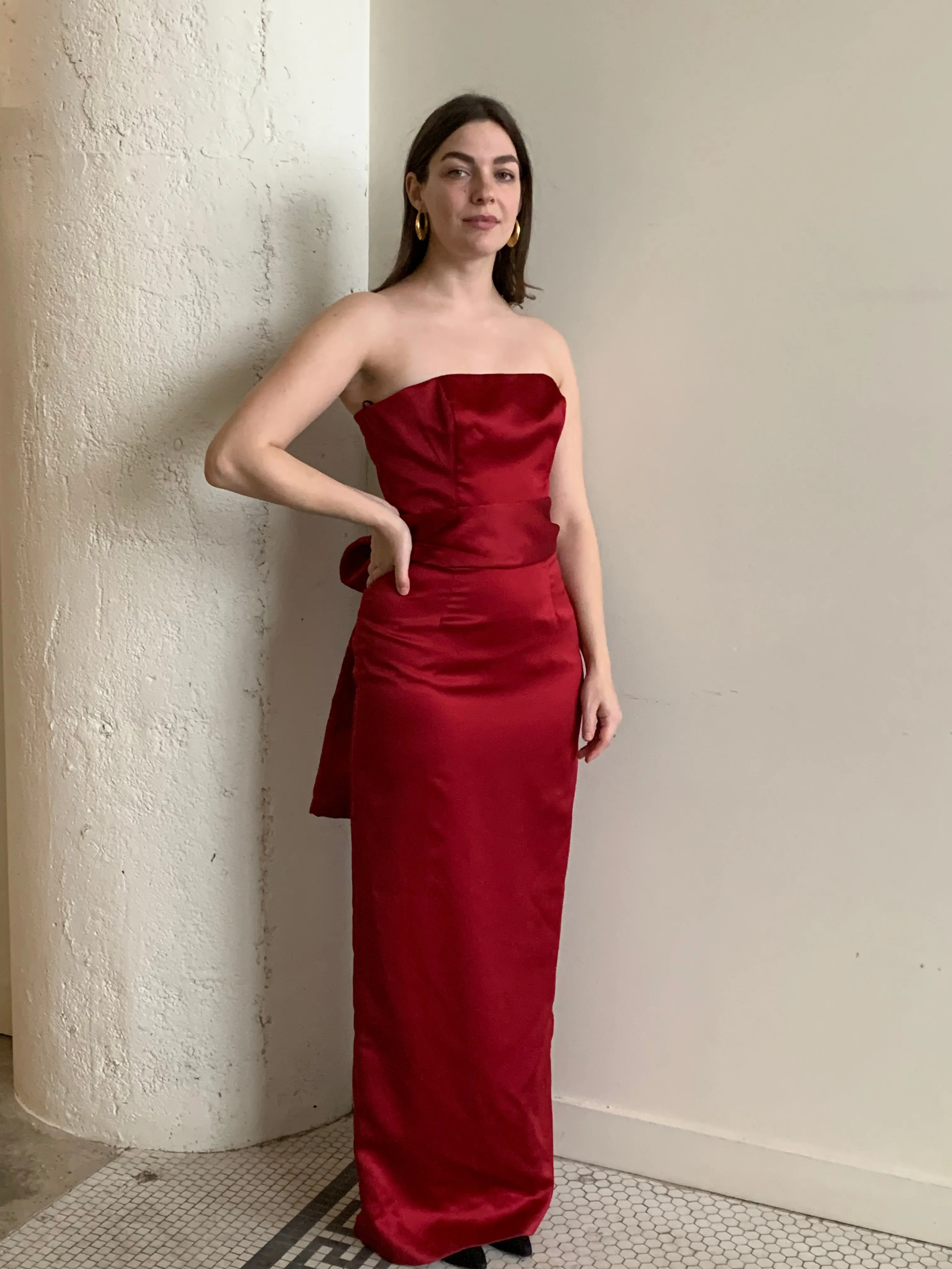 Red satin strapless gown